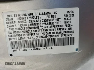 2007 Honda Odyssey EX-L z VIN 5FNRL38647B028078, wystawiony jako Copart lot #56208005 z przebiegiem 192 000 mil mil oraz Szkoda całkowita • Salvage title. Historia ofert i sprzedaży dostępna na DreamBid. Obrazek 12.