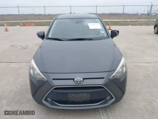 2019 Toyota Yaris Sedan L with VIN 3MYDLBYV2KY520151, listed as a IAAI auction lot 41590226 with 115,880 mi miles. Bid and sale history available at carsss.com. Image 12.