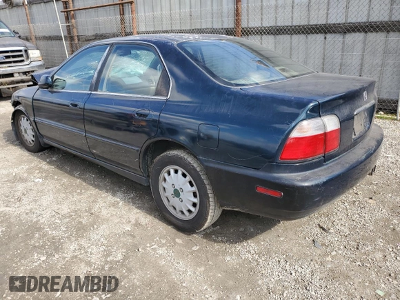 1997 Honda Accord EX with VIN 1HGCD5668VA262569, listed as a Copart auction lot 44713835 with 261,346 mi miles and Salvage Title. Bid and sale history available at DreamBid. Image 2.