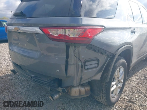 2021 Chevrolet Traverse LT Cloth with VIN 1GNEVGKW1MJ214200, listed as a IAAI auction lot 42021901 with 69,118 mi miles. Bid and sale history available at carsss.com. Image 21.