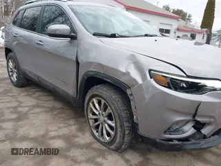 2019 Jeep Cherokee Latitude with VIN 1C4PJMCB9KD214299, listed as a IAAI auction lot 41689632 with 151,786 mi miles. Bid and sale history available at carsss.com. Image 6.