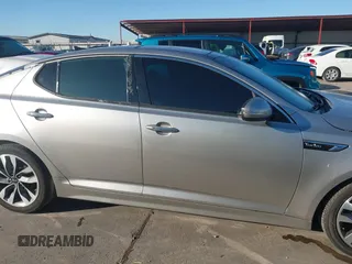 2015 Kia Optima SX Turbo with VIN 5XXGR4A65FG407334, listed as a IAAI auction lot 40743106 with 164,260 mi miles. Bid and sale history available at carsss.com. Image 13.