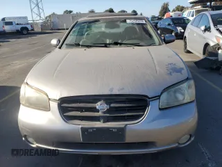 2001 Nissan Maxima SE 20th Anniversary. z VIN JN1CA31A91T314977, wystawiony jako Copart lot #75260034 z przebiegiem 178 471 mil mil oraz Szkoda całkowita • Salvage title. Historia ofert i sprzedaży dostępna na DreamBid. Obrazek 5.
