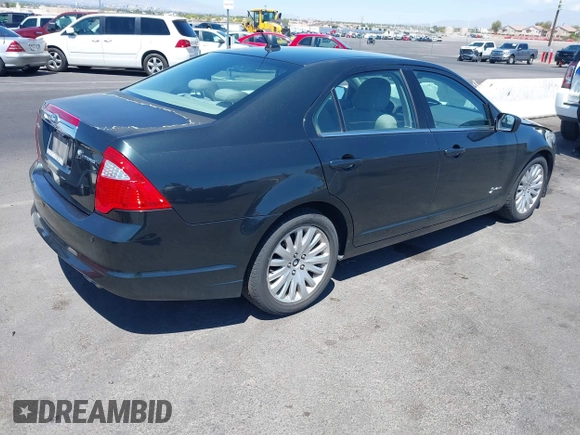 2010 Ford Fusion Hybrid with VIN 3FADP0L36AR355961, listed as a IAAI auction lot 42217637 with 256,817 mi miles and . Bid and sale history available at DreamBid. Image 4.