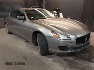 2015 Maserati Quattroporte S Q4 z VIN ZAM56RRAXF1158381, wystawiony jako IAAI lot #39717772 z przebiegiem 100 836 mil mil oraz . Historia ofert i sprzedaży dostępna na DreamBid. Obrazek 1.
