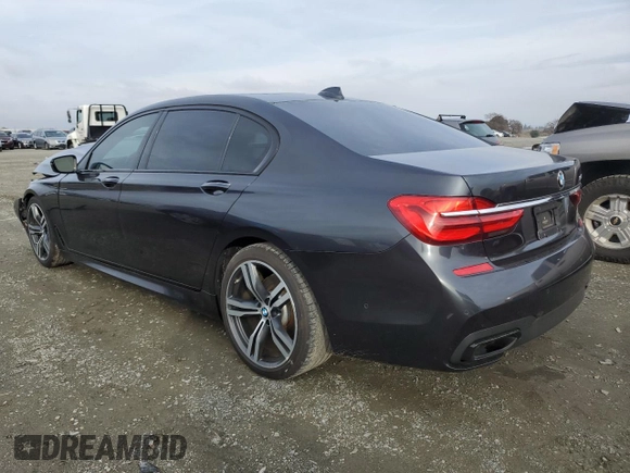 2016 BMW 7 Series 750i with VIN WBA7F0C5XGGM20402, listed as a Copart auction lot 86011914 with 90,123 mi miles and Salvage Title. Bid and sale history available at carsss.com. Image 2.