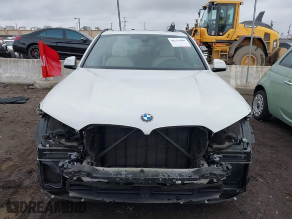 2022 BMW X5 sDrive40i with VIN 5UXCR4C09N9M22050, listed as a IAAI auction lot 41573419 with 33,574 mi miles. Bid and sale history available at carsss.com. Image 12.