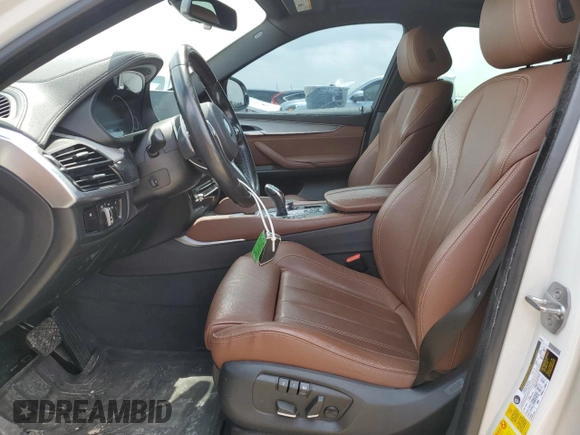 2018 BMW X6 sDrive35i with VIN 5UXKU0C52J0G80569, listed as a Copart auction lot 49991705 with 77,531 mi miles and Salvage Title. Bid and sale history available at carsss.com. Image 7.