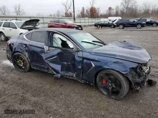 2020 Genesis G70 3.3T with VIN KMTG34LE5LU051058, listed as a Copart auction lot 77165163 with 0 mi miles. Bid and sale history available at carsss.com. Image 4.