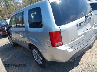 2013 Honda Pilot EX-L with VIN 5FNYF3H59DB022797, listed as a IAAI auction lot 41880675 with 206,359 mi miles and . Bid and sale history available at DreamBid. Image 3.