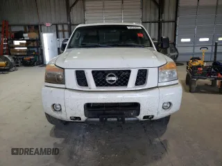 2010 Nissan Titan Pro-4X with VIN 1N6BA0EC3AN312601, listed as a Copart auction lot 52633455 with 161,260 mi miles and Salvage title. Bid and sale history available at DreamBid. Image 5.