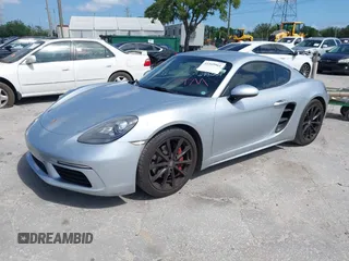2017 Porsche Cayman S with VIN WP0AB2A87HS285634, listed as a IAAI auction lot 41949961 with 57,422 mi miles and . Bid and sale history available at DreamBid. Image 2.