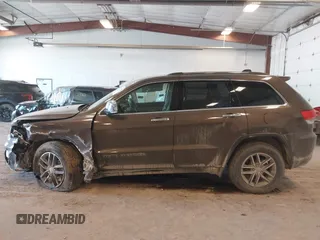 2018 Jeep Grand Cherokee Limited with VIN 1C4RJFBG9JC268479, listed as a IAAI auction lot 42032948 with 106,077 mi miles and . Bid and sale history available at DreamBid. Image 14.