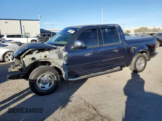2002 Ford F-150 XLT with VIN 1FTRW07652KE28329, listed as a Copart auction lot 86346454 with 209,720 mi miles and Salvage Title. Bid and sale history available at carsss.com. Image 1.