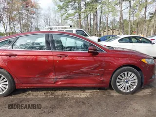 2014 Ford Fusion SE Hybrid with VIN 3FA6P0LU3ER301220, listed as a IAAI auction lot 41900873 with 251,303 mi miles. Bid and sale history available at carsss.com. Image 6.