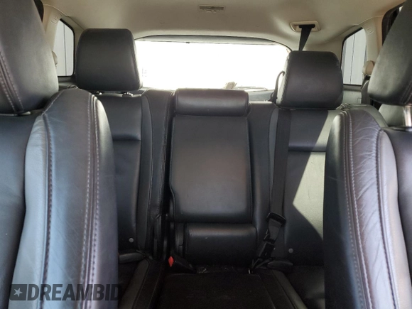 2012 Mazda CX-9 Grand Touring z VIN JM3TB3DV3C0335330, wystawiony jako Copart lot #57562015 z przebiegiem 171 397 mil mil oraz Szkoda całkowita • Salvage title. Historia ofert i sprzedaży dostępna na DreamBid. Obrazek 10.