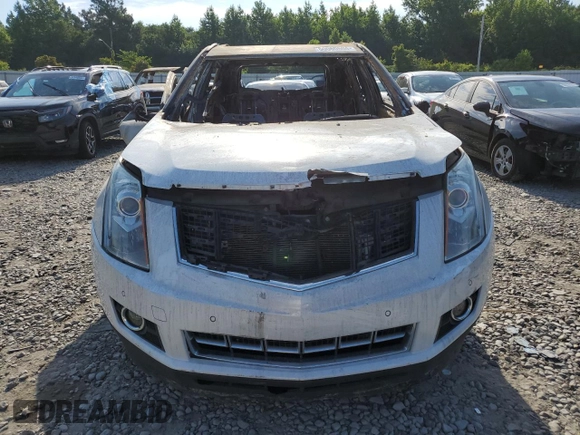 2016 Cadillac SRX Performance Collection с VIN 3GYFNCE36GS505053, выставлен на аукционе Copart как лот 60060604 с пробегом Не указан миль и На запчасти • Non repairable. История ставок и продаж доступна на DreamBid. Изображение 5.