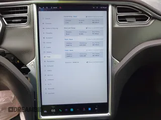 2015 Tesla Model S 85D with VIN 5YJSA1H42FF086599, listed as a IAAI auction lot 41832223 with 67,671 mi miles. Bid and sale history available at carsss.com. Image 18.