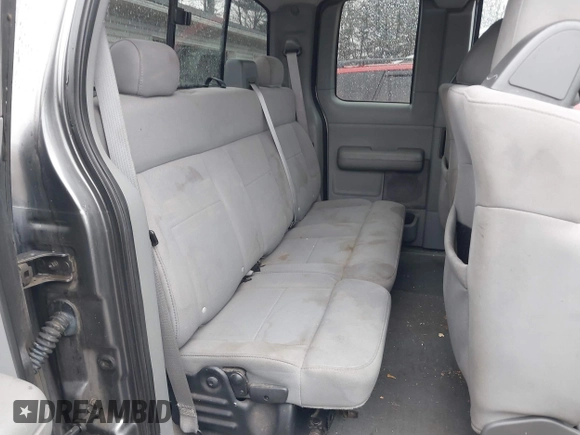 2006 Ford F-150 STX with VIN 1FTRX14W36NB21057, listed as a IAAI auction lot 41664686 with 217,363 mi miles. Bid and sale history available at carsss.com. Image 8.