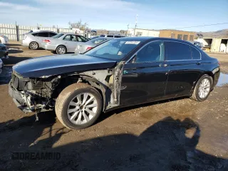 2015 BMW 7 Series 740Li with VIN WBAYE4C55FD947214, listed as a Copart auction lot 87261354 with 393,256 mi miles and Salvage Title. Bid and sale history available at DreamBid. Image 1.