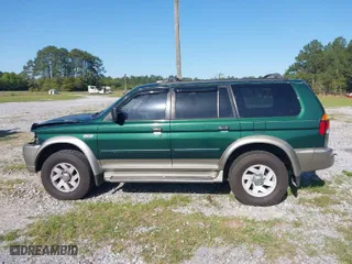 2000 Mitsubishi Montero Sport LS with VIN JA4LS31H0YP055199, listed as a IAAI auction lot 41990427 with 162,687 mi miles. Bid and sale history available at carsss.com. Image 15.