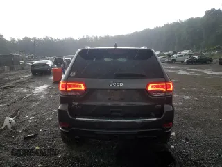 2017 Jeep Grand Cherokee Overland with VIN 1C4RJFCG4HC730861, listed as a Copart auction lot 62918825 with 77,228 mi miles and Salvage title. Bid and sale history available at DreamBid. Image 6.