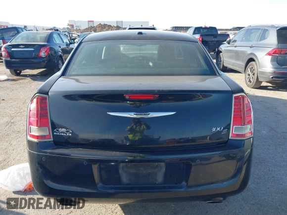 2013 Chrysler 300 with VIN 2C3CCABG7DH573164, listed as a IAAI auction lot 41851066 with 218,234 mi miles. Bid and sale history available at carsss.com. Image 16.