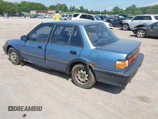 1991 Honda Civic z VIN 1HGED3649ML019481, wystawiony jako IAAI lot #42143741 z przebiegiem 352 104 mil mil oraz . Historia ofert i sprzedaży dostępna na DreamBid. Obrazek 3.