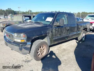 2002 GMC Sierra 1500 SLE with VIN 2GTEC19T321252686, listed as a IAAI auction lot 41355583 with 245,122 mi miles. Bid and sale history available at carsss.com. Image 2.