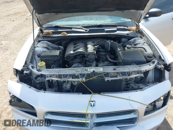 2010 Dodge Charger SXT with VIN 2B3CA3CV9AH311637, listed as a IAAI auction lot 42079657 with 187,683 mi miles. Bid and sale history available at carsss.com. Image 10.