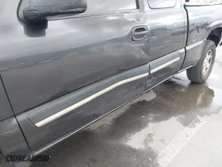 2003 Chevrolet Silverado 1500 LS with VIN 1GCEK19TX3E107860, listed as a IAAI auction lot 41461401 with 379,055 mi miles. Bid and sale history available at carsss.com. Image 6.
