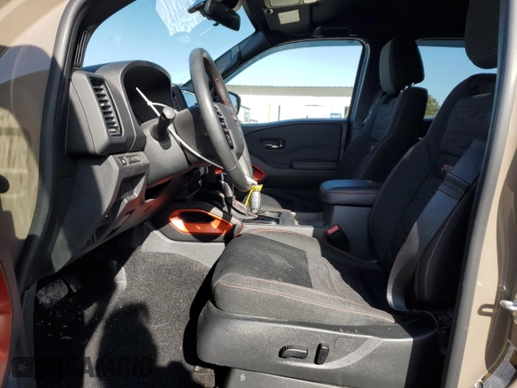 2024 Nissan Frontier SL with VIN 1N6ED1EK9RN657838, listed as a Copart auction lot 42253895 with 10,012 mi miles and Salvage title. Bid and sale history available at DreamBid. Image 7.