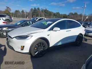 2021 Tesla Model X Long Range Plus with VIN 5YJXCDE29MF316169, listed as a IAAI auction lot 41232066 with 53,235 mi miles and . Bid and sale history available at carsss.com. Image 15.