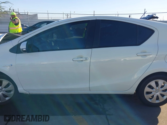 2014 Toyota Prius One with VIN JTDKDTB38E1575308, listed as a IAAI auction lot 40787857 with 70,891 mi miles and . Bid and sale history available at DreamBid. Image 14.