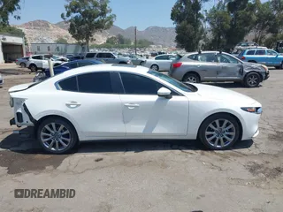 2023 Mazda 3 S Carbon Edition with VIN 3MZBPACM1PM356552, listed as a IAAI auction lot 42603574 with 20,092 mi miles and . Bid and sale history available at DreamBid. Image 14.