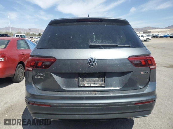 2020 Volkswagen Tiguan S with VIN 3VV0B7AX8LM025049, listed as a Copart auction lot 81767094 with 76,640 mi miles and Salvage title. Bid and sale history available at DreamBid. Image 6.