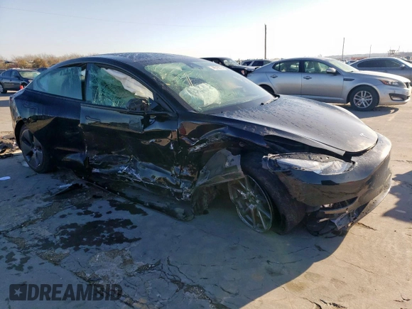 2021 Tesla Model 3 Standard Range Plus with VIN 5YJ3E1EA2MF977007, listed as a Copart auction lot 48516075 with Not Provided miles and Salvage Title. Bid and sale history available at DreamBid. Image 4.