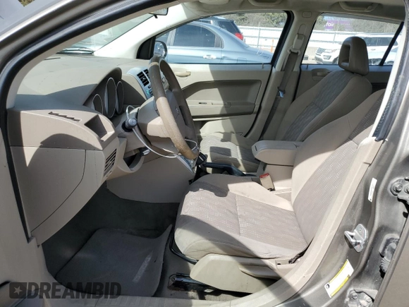 2007 Dodge Caliber SXT with VIN 1B3HB48B27D263783, listed as a Copart auction lot 53116575 with 164,533 mi miles and Salvage Title. Bid and sale history available at DreamBid. Image 7.