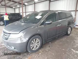 2014 Honda Odyssey EX-L with VIN 5FNRL5H6XEB060090, listed as a IAAI auction lot 41625571 with 112,762 mi miles and . Bid and sale history available at carsss.com. Image 2.
