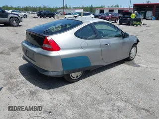 2004 Honda Insight z VIN JHMZE14744T000527, wystawiony jako IAAI lot #42378630 z przebiegiem 1 360 mil mil oraz . Historia ofert i sprzedaży dostępna na DreamBid. Obrazek 4.