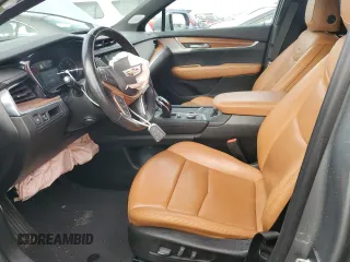 2023 Cadillac XT5 FWD Premium Luxury with VIN 1GYKNCRS6PZ100071, listed as a Copart auction lot 76248224 with 25,613 mi miles and Salvage Title. Bid and sale history available at carsss.com. Image 7.