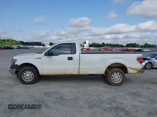 2013 Ford F-150 XL with VIN 1FTMF1CMXDKE37423, listed as a IAAI auction lot 42261679 with 185,759 mi miles and . Bid and sale history available at DreamBid. Image 14.