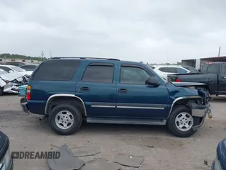 2005 Chevrolet Tahoe LS with VIN 1GNEC13V35R202755, listed as a IAAI auction lot 41951169 with 88,330 mi miles and . Bid and sale history available at DreamBid. Image 13.