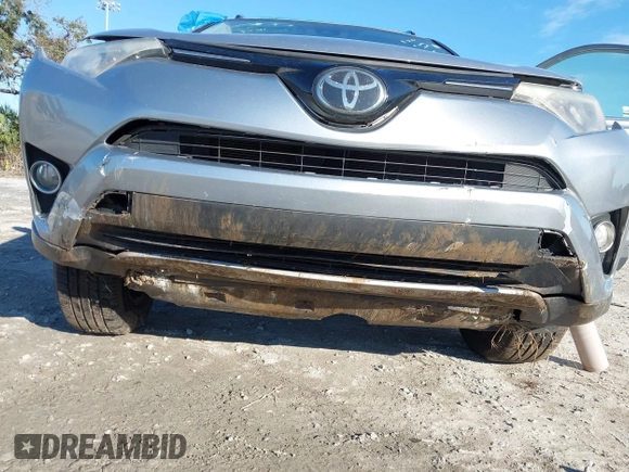 2018 Toyota RAV4 XLE with VIN JTMWFREV7JD125119, listed as a IAAI auction lot 41841021 with 132,659 mi miles and . Bid and sale history available at DreamBid. Image 6.
