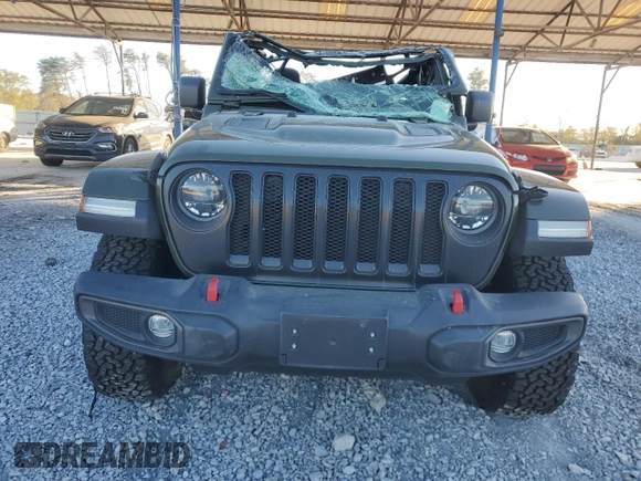 2021 Jeep Wrangler Unlimited Rubicon с VIN 1C4HJXFN6MW652765, выставлен на аукционе Copart как лот 81967164 с пробегом 52 380 миль миль и Списание • Salvage title. История ставок и продаж доступна на DreamBid. Изображение 5.