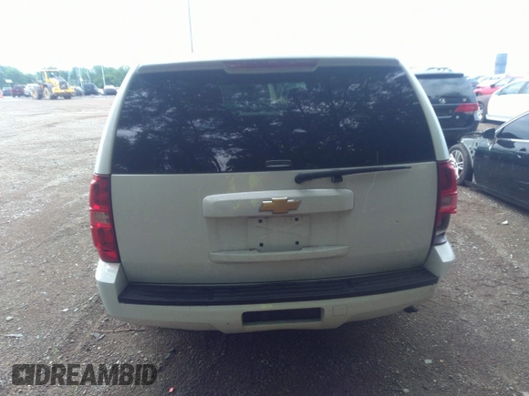 2013 Chevrolet Tahoe Commercial with VIN 1GNLC2E05DR351035, listed as a IAAI auction lot 42641974 with 265,608 mi miles and . Bid and sale history available at DreamBid. Image 16.