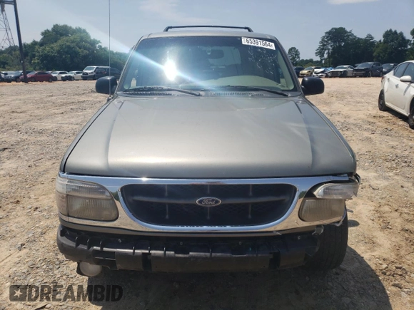 1999 Ford Explorer XLT z VIN 1FMZU32E4XUB76005, wystawiony jako Copart lot #65391564 z przebiegiem 245 873 mil mil oraz Szkoda całkowita • Salvage title. Historia ofert i sprzedaży dostępna na DreamBid. Obrazek 5.