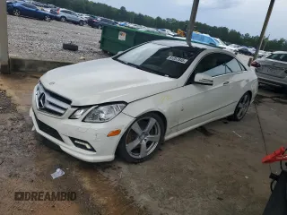 2010 Mercedes-Benz E 550 with VIN WDDKJ7CBXAF042837, listed as a Copart auction lot 61257645 with 86,595 mi miles and Salvage title. Bid and sale history available at DreamBid. Image 1.