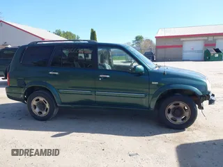2002 Suzuki XL-7 Standard with VIN JS3TX92V124124409, listed as a IAAI auction lot 42166017 with 194,418 mi miles. Bid and sale history available at carsss.com. Image 14.