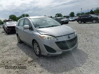 2012 Mazda 5 Sport z VIN JM1CW2BL2C0127190, wystawiony jako Copart lot #56655175 z przebiegiem 129 255 mil mil oraz Szkoda całkowita • Salvage title. Historia ofert i sprzedaży dostępna na DreamBid. Obrazek 14.